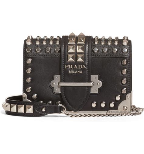 prada cahier studded bag.